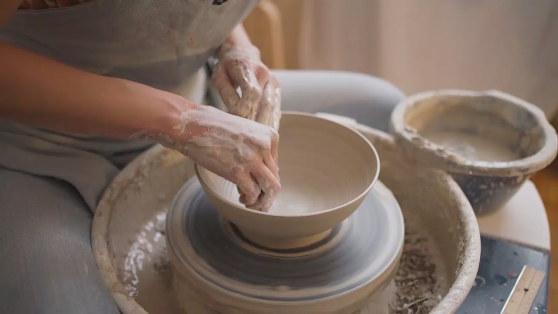 Short clip of wheel-throwing at Made of Dust pottery studio.